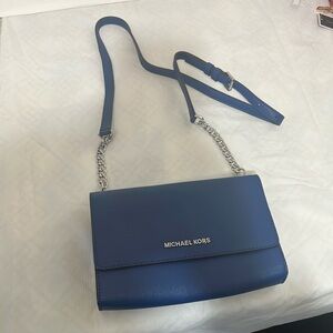 Gently used blue Michael Kors bag.